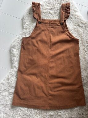 Corduroy jumper with ruffle